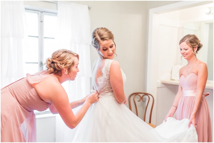 Kansas City Outdoor Wedding Venue Package Kc Bridesmaid Helping Bride Zip Up Dress For Wedding At Faulkner S Ranch